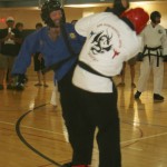 That's me, grabbing two points for a head kick at a recent tournament in Alamosa, CO