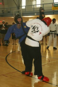 That's me, grabbing two points for a head kick at a recent tournament in Alamosa, CO